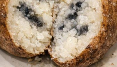 I baked a large russet potato for dinner, but after slicing it open, I found these dark grey streaks and spots inside the flesh. It’s not hollow, just discolored. Is this safe to eat?