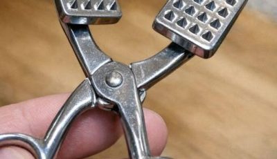 Inherited a box of utensils and this scary-looking clamp was inside. It opens like scissors but has spiked plates on the ends. Looks medical?