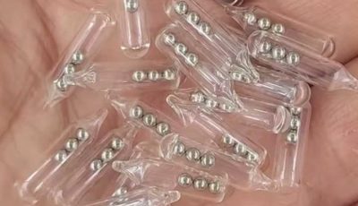 Identifying Small Glass Tubes Containing Three Tiny Ball Bearings
