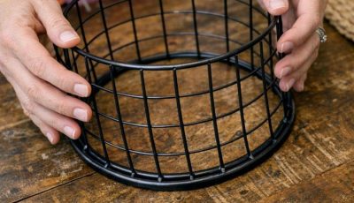 Lady flips Dollar Store wire hampers with a tray. This one stopped people scrolling
