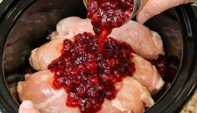 Pour cranberry sauce over raw chicken breasts, together with 2 ingredients, into slow cooker for a tangy dinner that’s always a yes in my house
